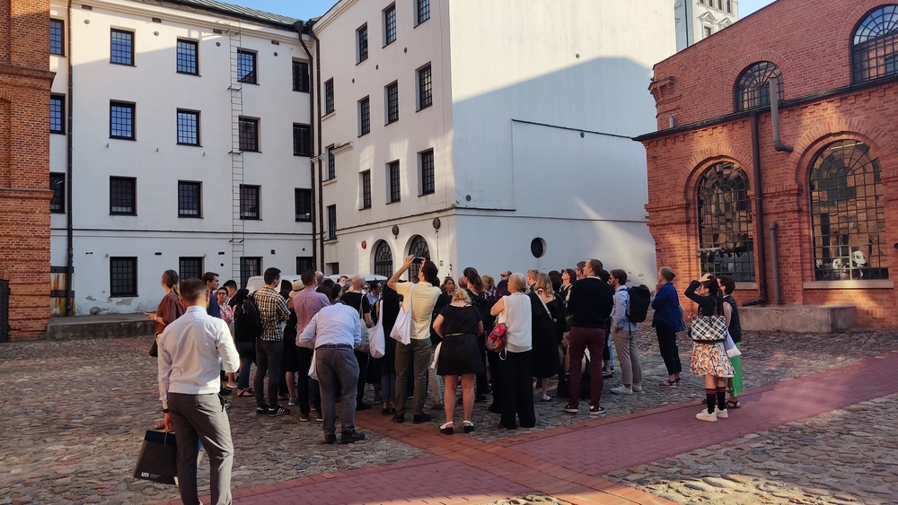 The conference participants during a walk around the patio of the Central Museum of Textiles