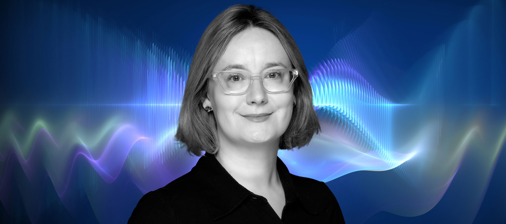 Dr Justyna Anders-Morawska against the background of graphics resembling a sound wave