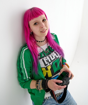 Aleksandra Wysokińska, a young woman with pink hair